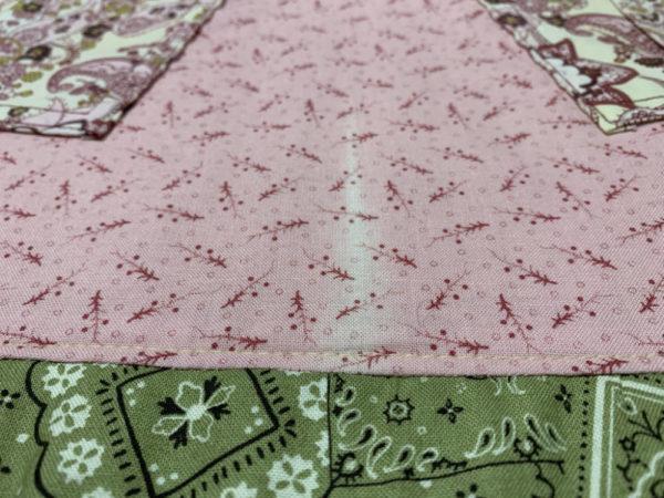 pink prairie full length apron fabric defect